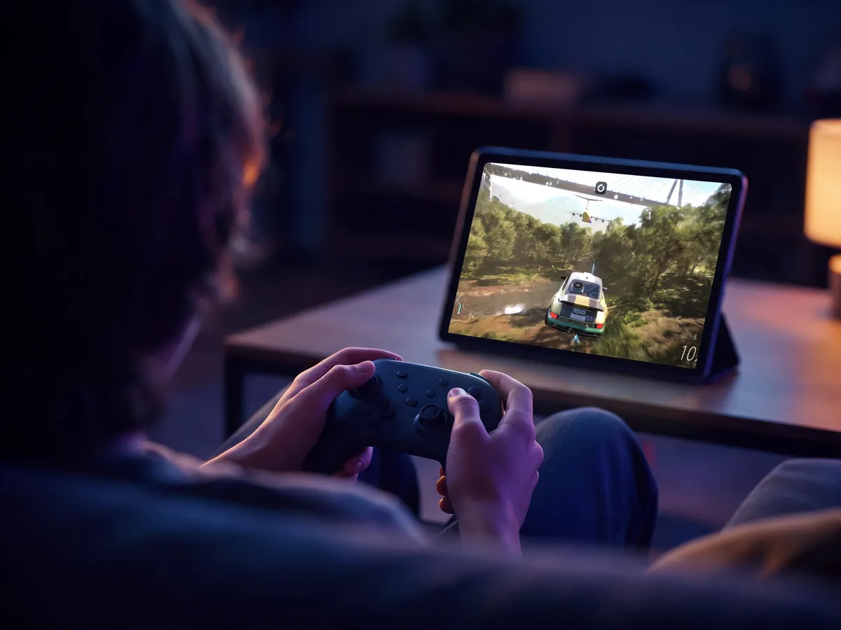 Forza Horizon 5 on an Android tablet, played with a controller from the sofa